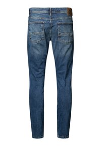 Vaqueros de denim azul con un corte ajustado, con una cintura de altura media, cinco bolsillos y detalles de costura a lo largo de las costuras y bolsillos.