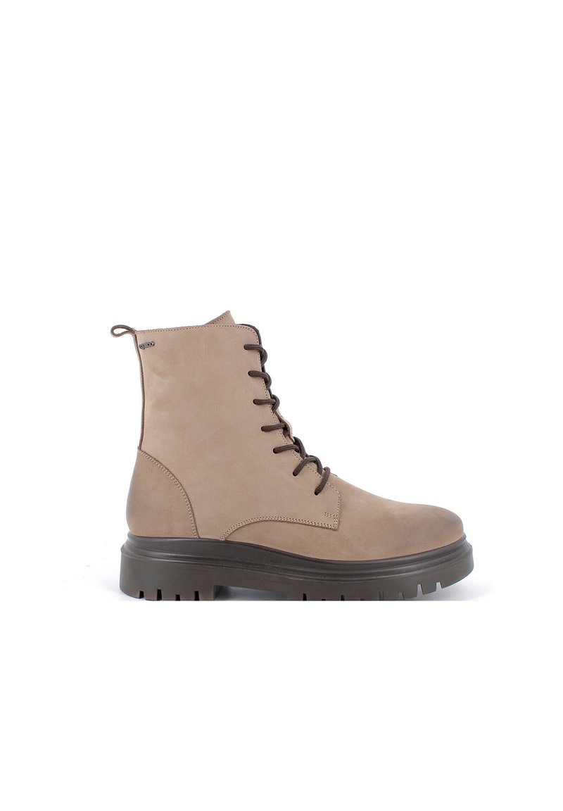 Stivale alla caviglia beige con lacci, realizzato in suede, con una suola spessa scura, punta rotonda e un anello in tessuto sul retro per un facile indossamento.