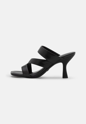 Mules med hæl - black