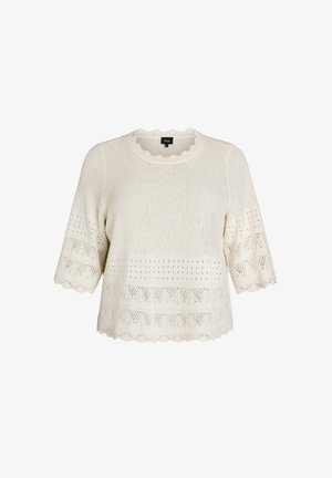 Pull en maille crème avec bords festonnés, manches courtes et détails en ajourés à motifs sur le corps et les manches.