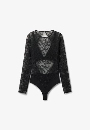 Bodysuit en dentelle noire à manches longues, avec un décolleté en V profond, des motifs floraux, et un panneau inférieur noir uni. Paillettes décoratives incluses.