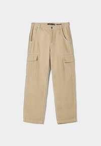 Beige Cargo-Hosen aus Baumwolle, ausgestattet mit zwei seitlichen Taschen, zwei Cargotaschen, einer geraden Passform und sichtbaren Nähten.