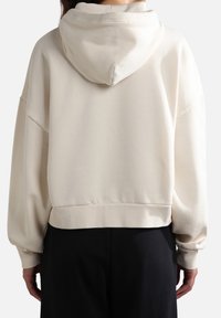 Avskuren, huva sweatshirt i off-white, med en avslappnad passform och ribbade mudd. Mjuk textur med en minimalisk design.