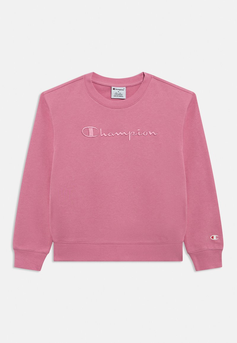 Ροζ φούτερ από μαλακό ύφασμα, με κεντημένο λογότυπο «Champion» σε έναν πιο ανοιχτό τόνο στο εμπρός μέρος και λεπτομέρεια λογοτύπου στο μανίκι.