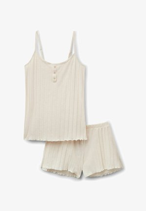Roomkleurige geribbelde gebreide cami met drie knopen en bijpassende shorts met elastische taille, voorzien van gegolfde zoom.