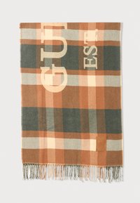Coperta a quadri in arancione, verde e beige con bordi frangiati. Presenta grandi elementi testuali "GUT" e "EST", etichetta in pelle attaccata.