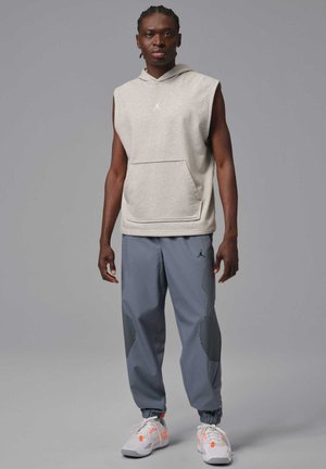 SPRT JAM WARM UP PANT - Pantalones deportivos - off-noir