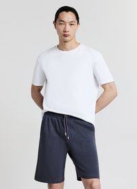 Calliope GINNICO - Pantaloni sportivi - grigio scuro melange