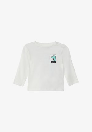 Witte langemouwen shirt van katoen, met een turquoise cartoon dinosaurustekening in een vierkant met zwarte rand op de borst.