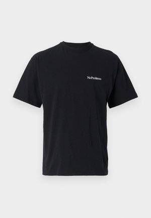 T-shirt in cotone nero con scollo rotondo e maniche corte. Presenta la scritta bianca "No Problemo" sul lato sinistro del petto.