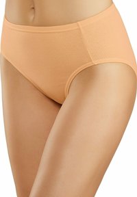 Hoogwaardige, geribbelde onderbroek in een zachte perzik kleur. Heeft een gladde textuur en is ontworpen voor comfort en bedekking.
