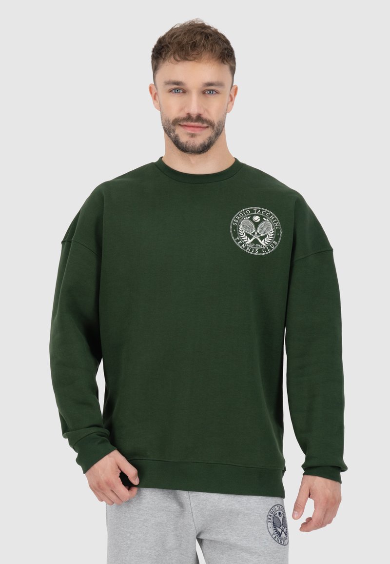 Felpa verde con collo tondo e maniche lunghe. Presenta una stampa del logo sul davanti. Tessuto morbido con una vestibilità comoda e polsini a coste.