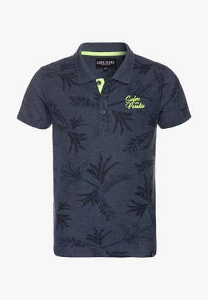 Polo blu navy a maniche corte con motivi di foglie tropicali nere e testo verde lime "Surfers Cars Paradise" sul petto.