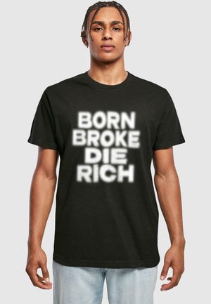 Black cotton t-shirt featuring bold white text: "BORN BROKE DIE RICH." Short sleeves with a relaxed fit and crew neckline.