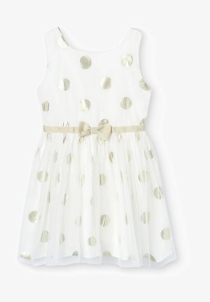 Vestido blanco sin mangas con lunares dorados, una cinturilla dorada y un pequeño lazo en el centro de la cintura, con una sobrefalda de tul.