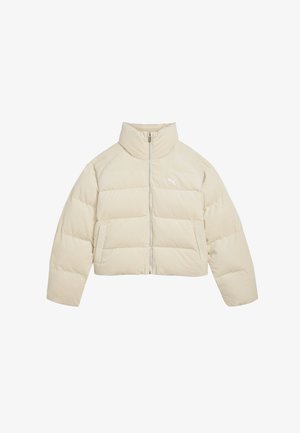 világos bézs puffernadrág, bordás textúrával, magas gallérral, elöl cipzárral és fehér logóval. Rövidített sziluett széles ujjal.