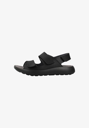 Sandalo nero con apertura sulla punta, cinturini in Velcro regolabili sul piede e sul tallone, suola spessa imbottita e fodera interna morbida.