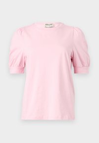 Blouse rose clair à manches courtes avec manches bouffantes et col rond, présentée sur un fond uni.