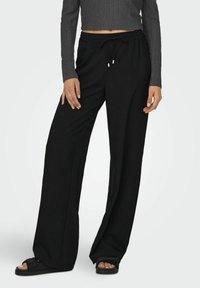 ONLY MIT WEITEM WEITER BEINSCHNITT HOHE TAILLE - Pantaloni - black