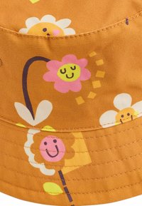 Next Hattu - rust floral