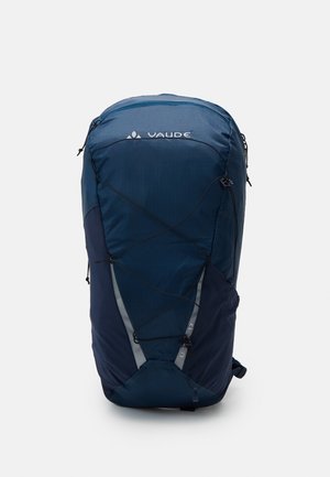 Sac à dos bleu marine au design élégant, fabriqué en matériau durable. Il dispose de cordes élastiques, d'un haut zippé et d'accents gris.