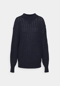 Pull en tricot bleu marine avec un col montant, des manches longues, un motif texturé et des poignets côtelés. Léger, coupe décontractée et conception à mailles ouvertes.
