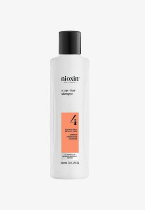 Nioxin Pro Clinical Scalp + Hair Shampoo in a white bottle with a black cap. Orange label indicates formula for colored, dry, damaged hair. 300 mL.
