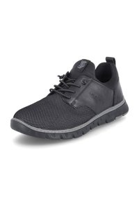 Chaussures de sport noires avec un dessus en mesh, un design texturé, un système de laçage à l'avant et une semelle rembourrée. Présence d'un logo près de la cheville.