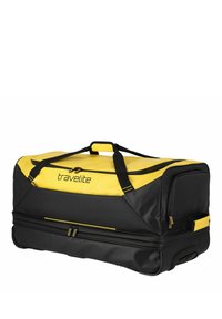 Borsa da viaggio nera e gialla con un design robusto, dotata di doppie maniglie, cerniere e un logo sulla parte anteriore. Materiale testurizzato per una maggiore durata.
