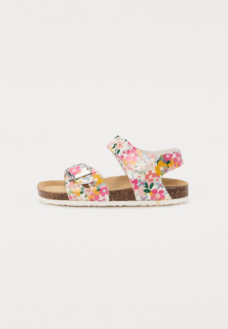 Colorful floral-patterned sandal with adjustable buckle, cork footbed, and white outsole. Straps designed for comfort and support.