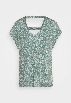 Blusa verde a maniche corte con stampa floreale bianca e dettaglio con scollatura quadrata sul retro.