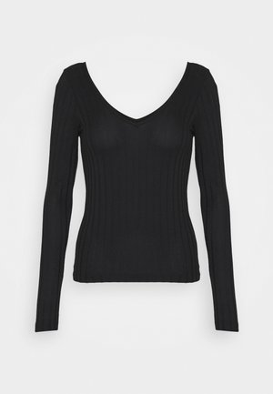 Schwarzes langärmliges, geripptes Stricktop mit tiefem V-Ausschnitt und figurbetonter Silhouette.