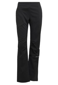 Černé venkovní kalhoty s rovnými nohavicemi, bočními kapsami a malým reflexním logem na pravém stehně.