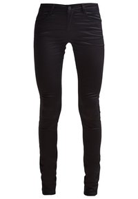 Černé džíny vyrobené z elastického materiálu, s elegantním střihovým designem, pěti kapsami a hladkou texturou, zapínání na zip a knoflík.