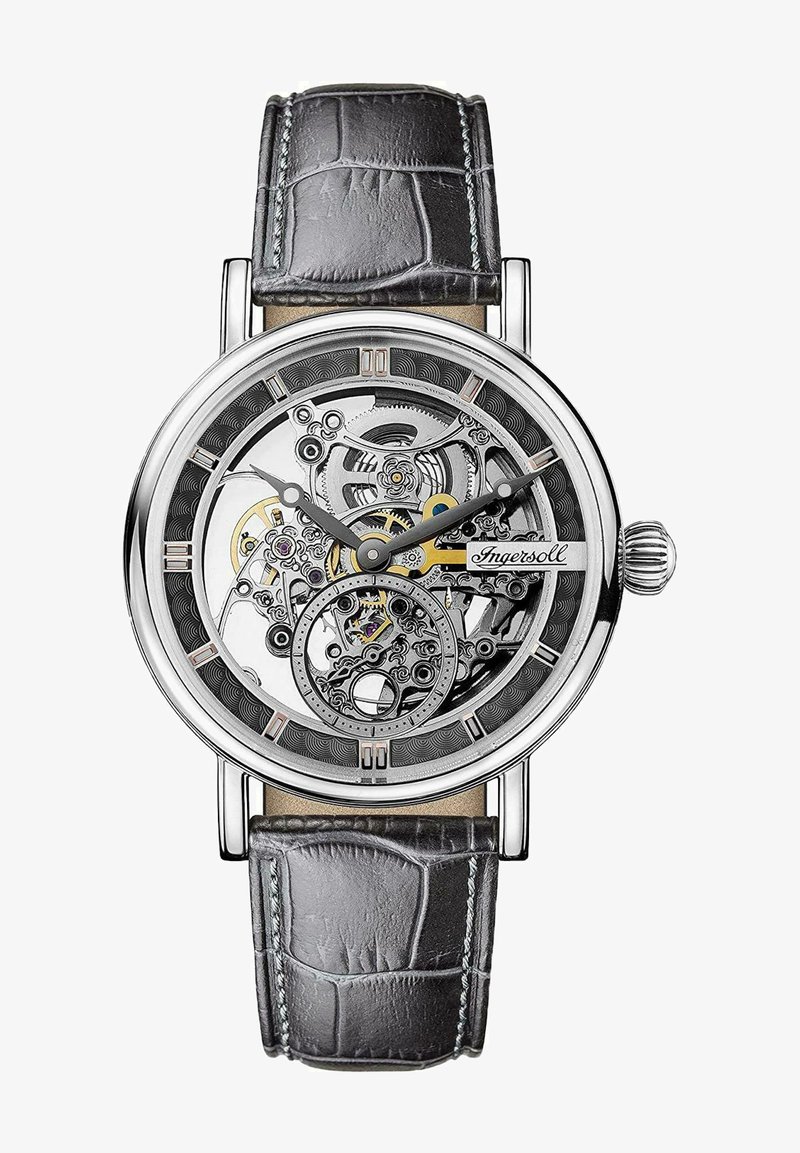 Orologio scheletrato con cassa in acciaio inox argentato, cinturino in pelle di coccodrillo grigia, quadrante trasparente che rivela intricati componenti meccanici, dettagli neri.