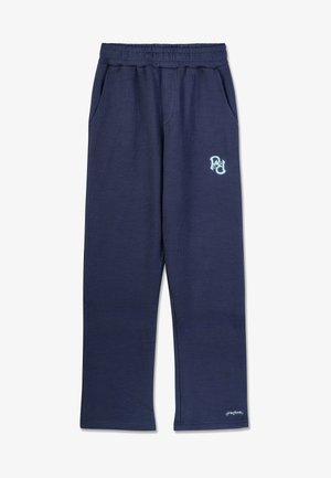 Pantaloni da jogging a coste blu navy con vita elasticizzata, tasche laterali e un logo blu chiaro sul fianco. Tessuto morbido.