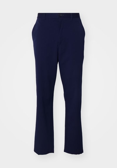 Mørkeblå bukser med rett ben-design. Laget av et glatt stoff, med knappestolpe og to sidelommer.