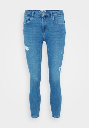 Jeans skinny in denim blu chiaro con un design strappato, presentano strappi su entrambe le gambe e uno stile classico a cinque tasche.