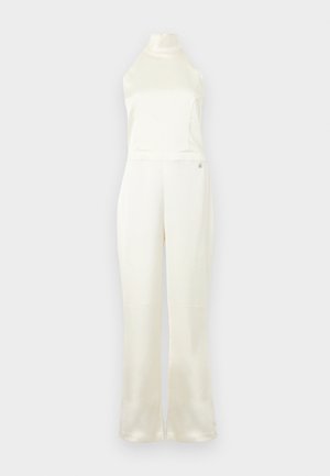Cream satin jumpsuit with a high neck, fitted bodice, and wide-leg pants. Features a small logo accent near the waist. Smooth texture.