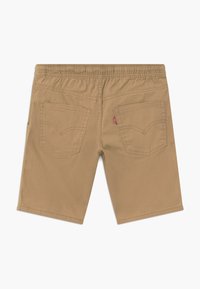 Khaki kraťasy s elastickým pasem, vybavené dvěma zadními kapsami a detailem šití. Vyrobené z měkké, odolné tkaniny.