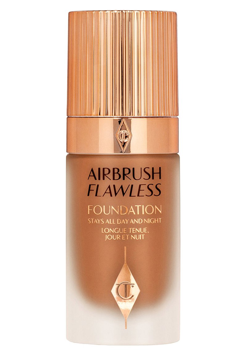 Airbrush Flawless Foundation in a gradient glass bottle with a rose gold ribbed cap and gold lettering. Smooth texture, 30ml volume.