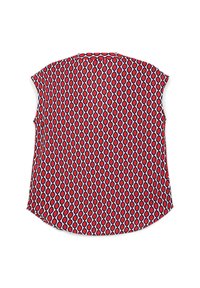 Blusa rossa a maniche corte caratterizzata da un motivo geometrico di ovali rossi, bianchi e neri alternati su un tessuto liscio. Orlo curvo.