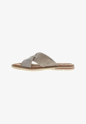 Tan and beige slide sandal with cross-strap design, textured fabric and smooth leather elements, cushioned footbed, and ridged sole.