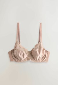 Csipkés, finom nude szatén melltartó, amelynek merevítős kosarai, állítható pántjai és sima, fodros részletekkel ellátott szélei vannak.