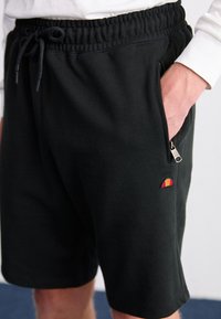 Ellesse ROMOIA - Pantalon de survêtement - black