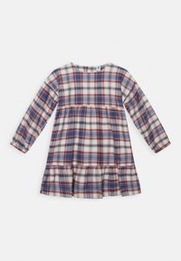 Šaty s dlouhým rukávem v károvaném vzoru s červenou, modrou a krémovou barvou. Sukně s patry, kulatým výstřihem a elastickými rukávy.
