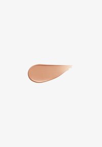 Light beige foundation cream swatch with smooth texture on a white background, shaped like a rounded teardrop.
