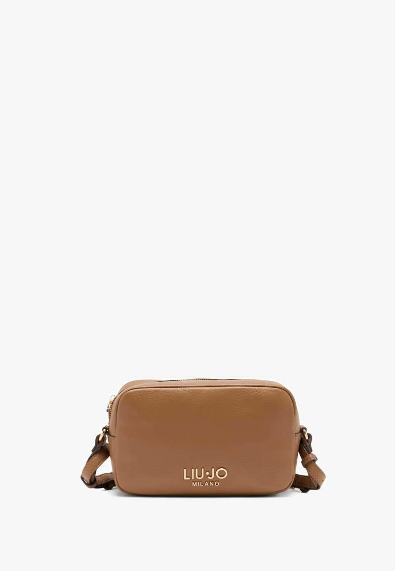 Brown leather crossbody bag with a rectangular shape, gold logo detailing, a zip closure, and an adjustable strap. Smooth texture throughout.