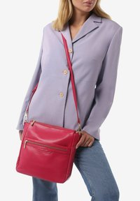 Miriade Borsa a tracolla - fuxia
