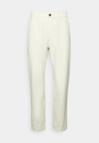 Světlé béžové kalhoty vyrobené z bavlněné směsi, s přímým střihem, zipem, jedním knoflíkem a předními kapsami. Hladká textura.